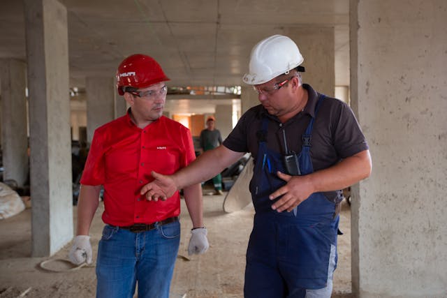 construction workers discussing project