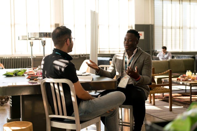 two men discussing something